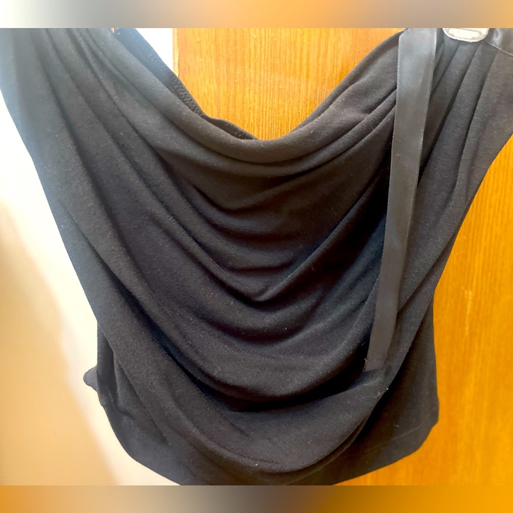 Black top with drape drop in the front